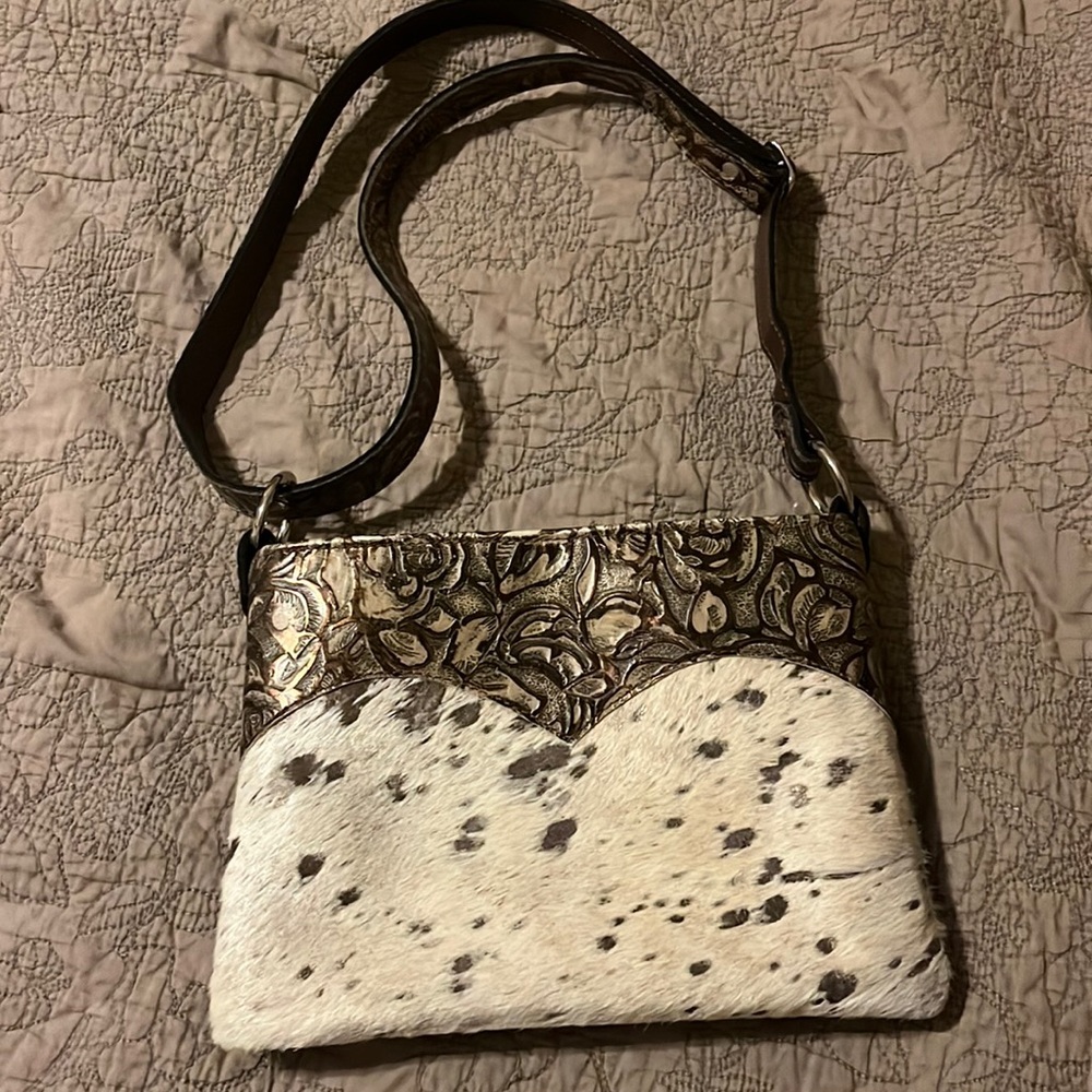 Custom made cow hide /leather adjustable cross body purse carried 1 time